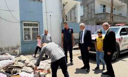 Başkan Hallaç, yangın mağduru aileyi yalnız bırakmadı